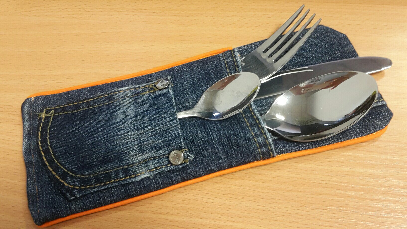 jeans cutlery bag full
